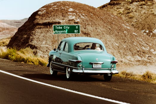 Classic car owner with their vehicle